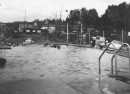 An old black and white photo of the hot spring pool in its beginnings.